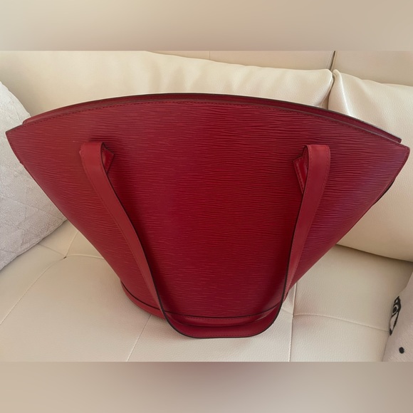 Handbags - Rubis Epi Louis Vuitton St. Jacques single slit pocket zip closure at top.